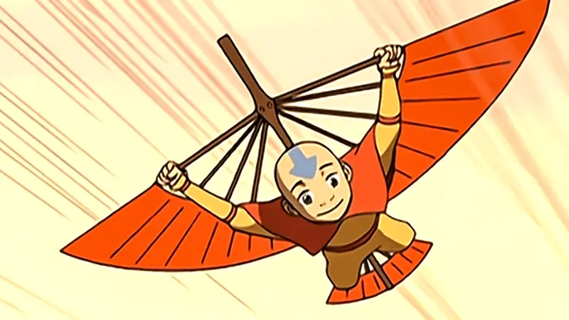 Aang sedang terbang dengan glidernya