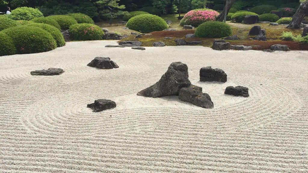 Gambar taman zen Jepang yang menenangkan, mencerminkan kedamaian dan keseimbangan.