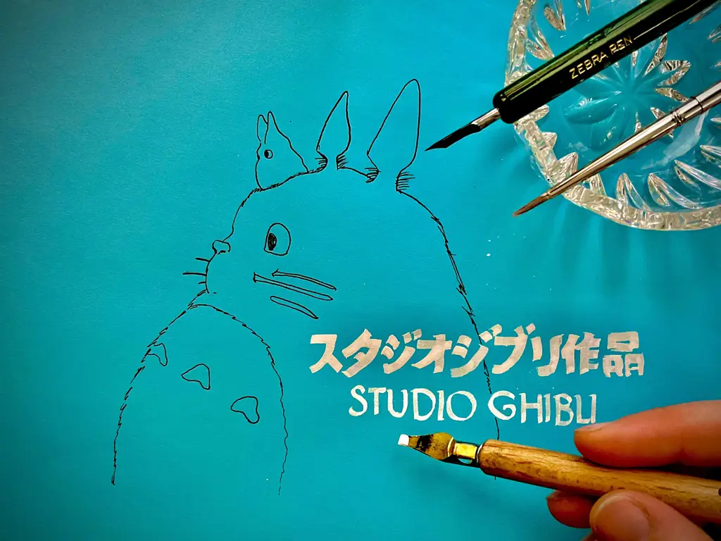 Logo Studio Ghibli, studio animasi terkenal dari Jepang.