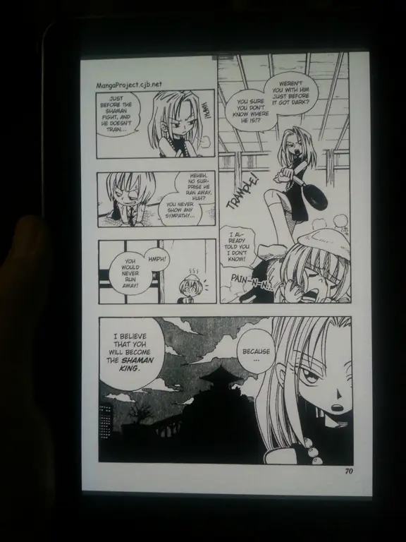 Seseorang membaca manga di tablet