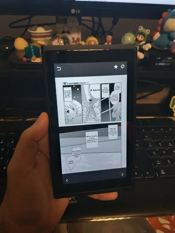 Seseorang membaca manga di tablet