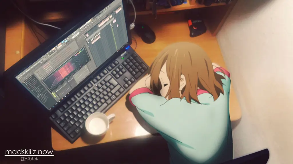 Seseorang menonton anime di laptopnya