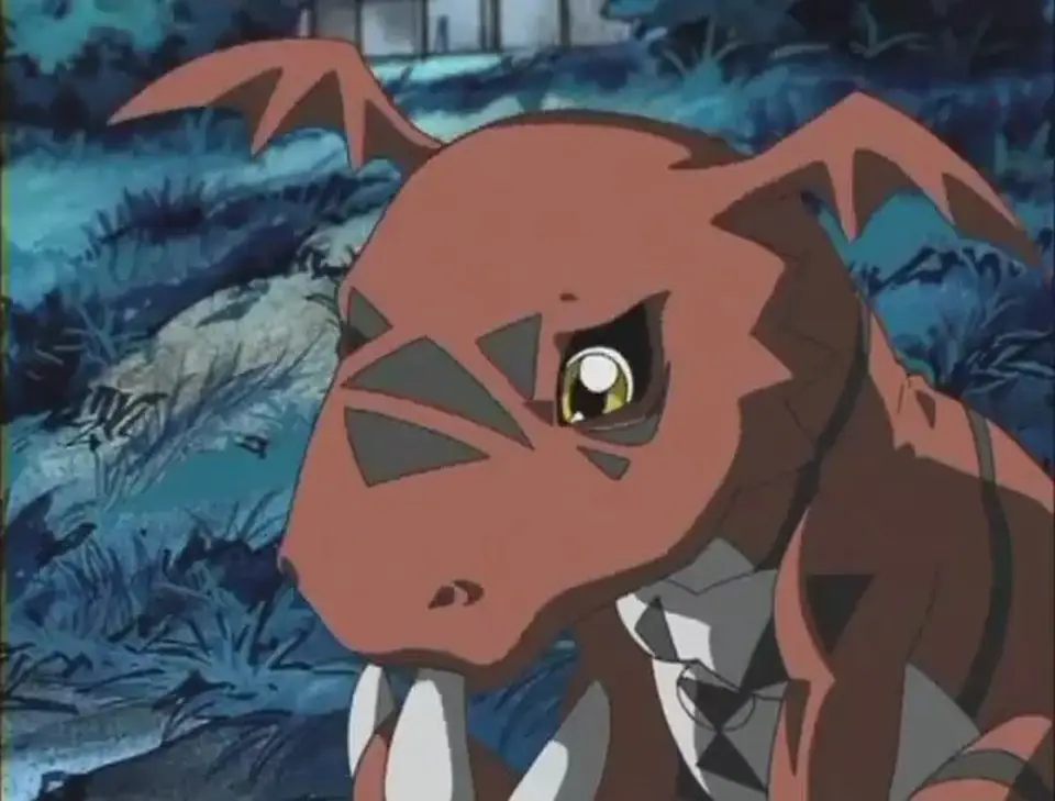 Guilmon, Digimon api partner Takato, muncul dari kartu Digimon.