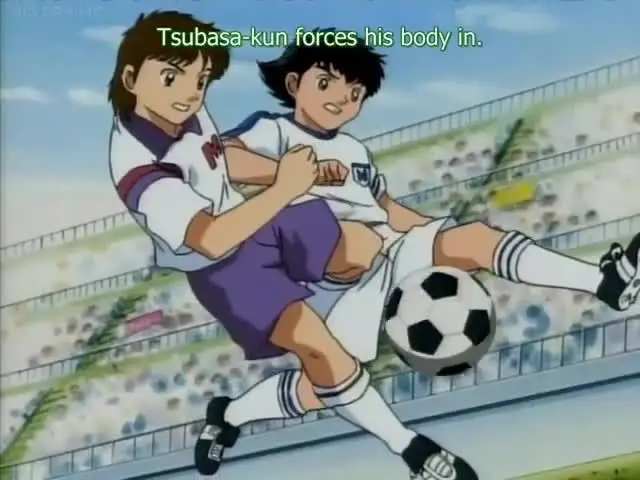 Screenshot anime Captain Tsubasa Road to 2002 yang menampilkan Tsubasa Ozora dan teman-temannya sedang bermain sepak bola.