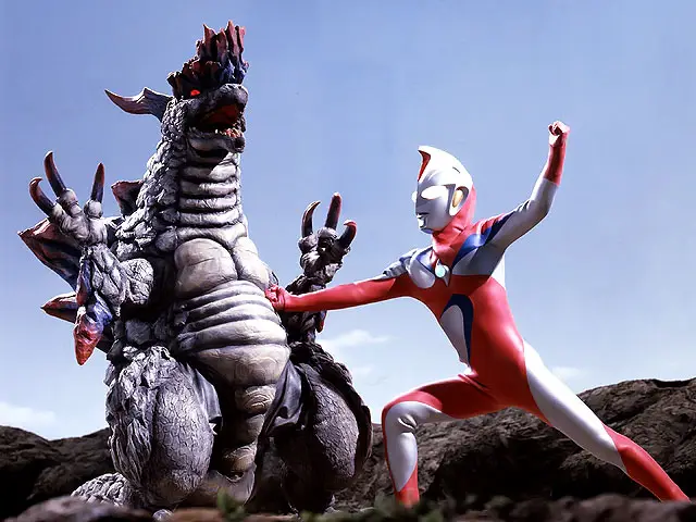 Ultraman Z sedang melawan monster raksasa.