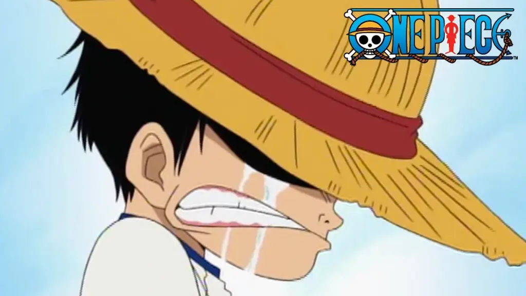 Shanks memberikan topi jeraminya kepada Luffy